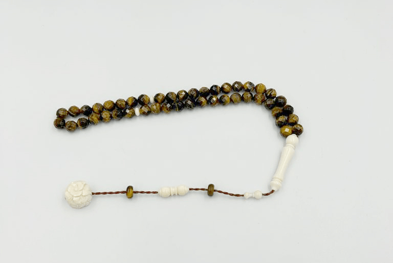 سبحة عقيق محجر عين النمر مع عاج 33 خرزة سبحة عقيق محجر عين النمر مع عاج 33 خرزة